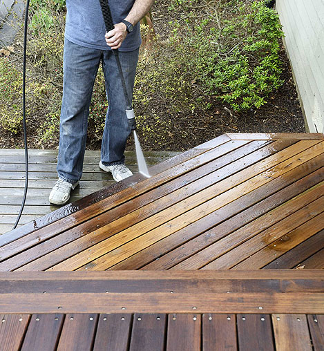 Wooden deck cleaning during pressure washing photo two